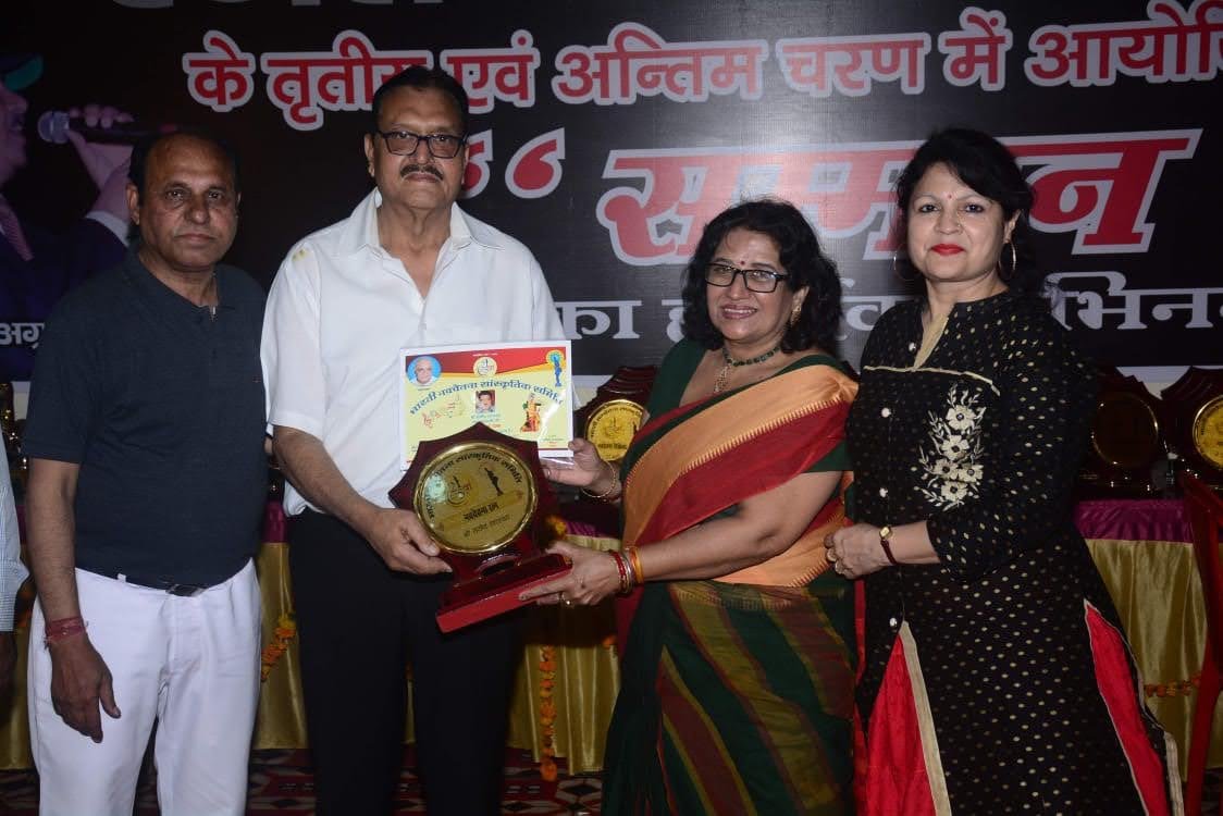 Mukesh Mehrotra receiving awards