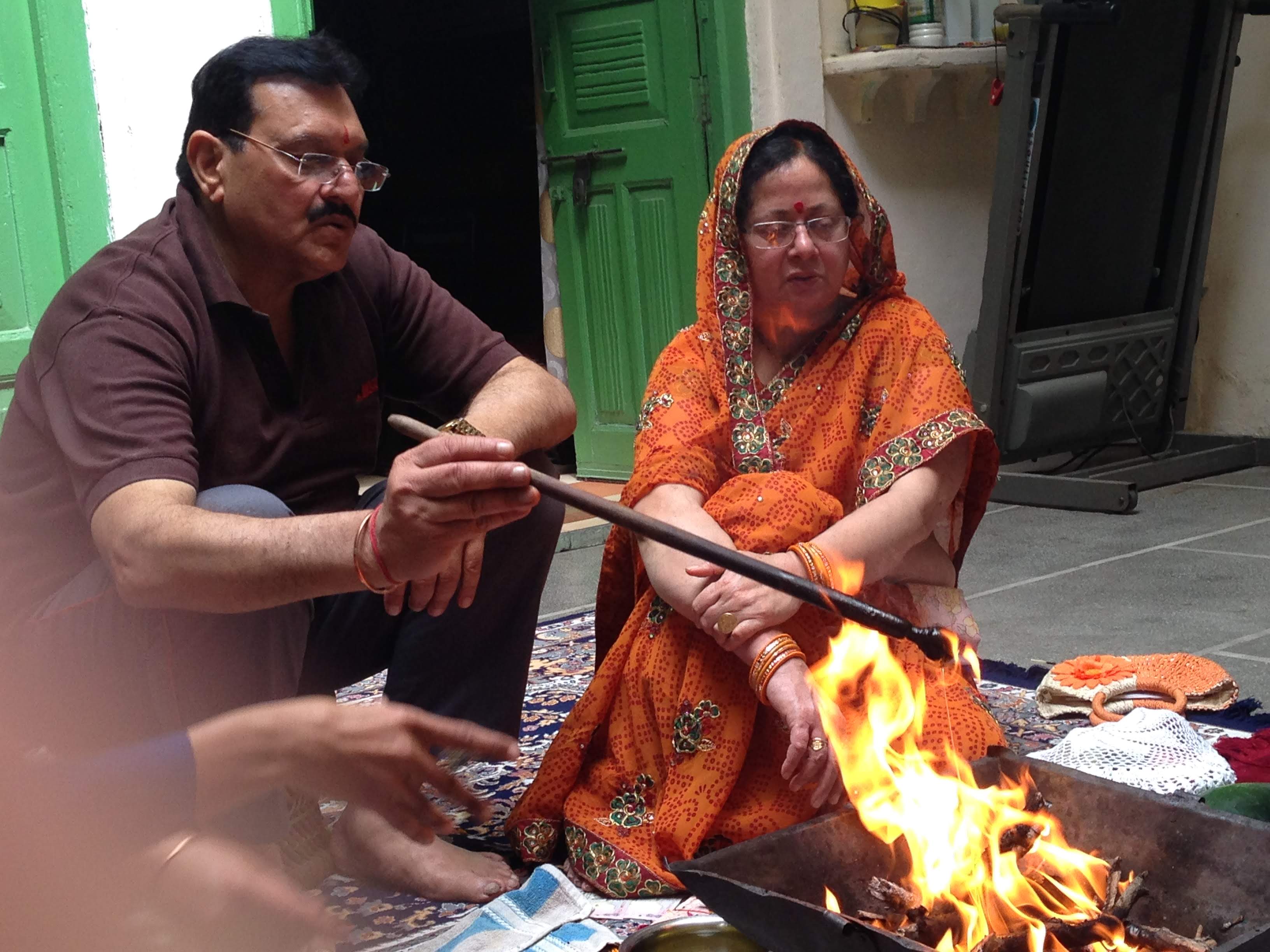Beena Mehrotra and Mukesh Mehrotra performing a havan together at their Kashipur home — a partnership behind every public decision