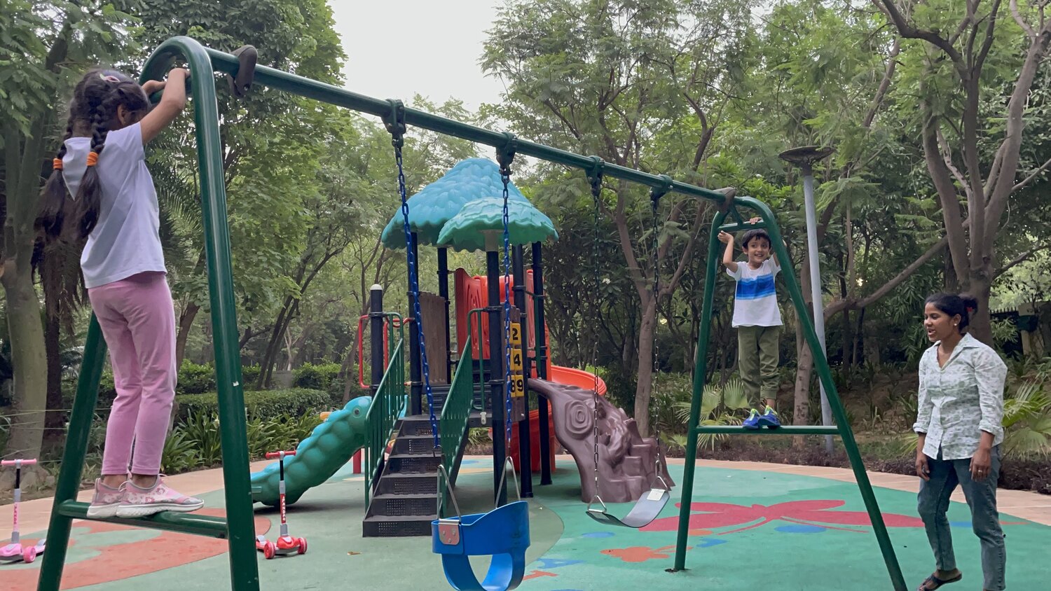 Naimee Orang watching Khushboo Sachdev's twins play at the park