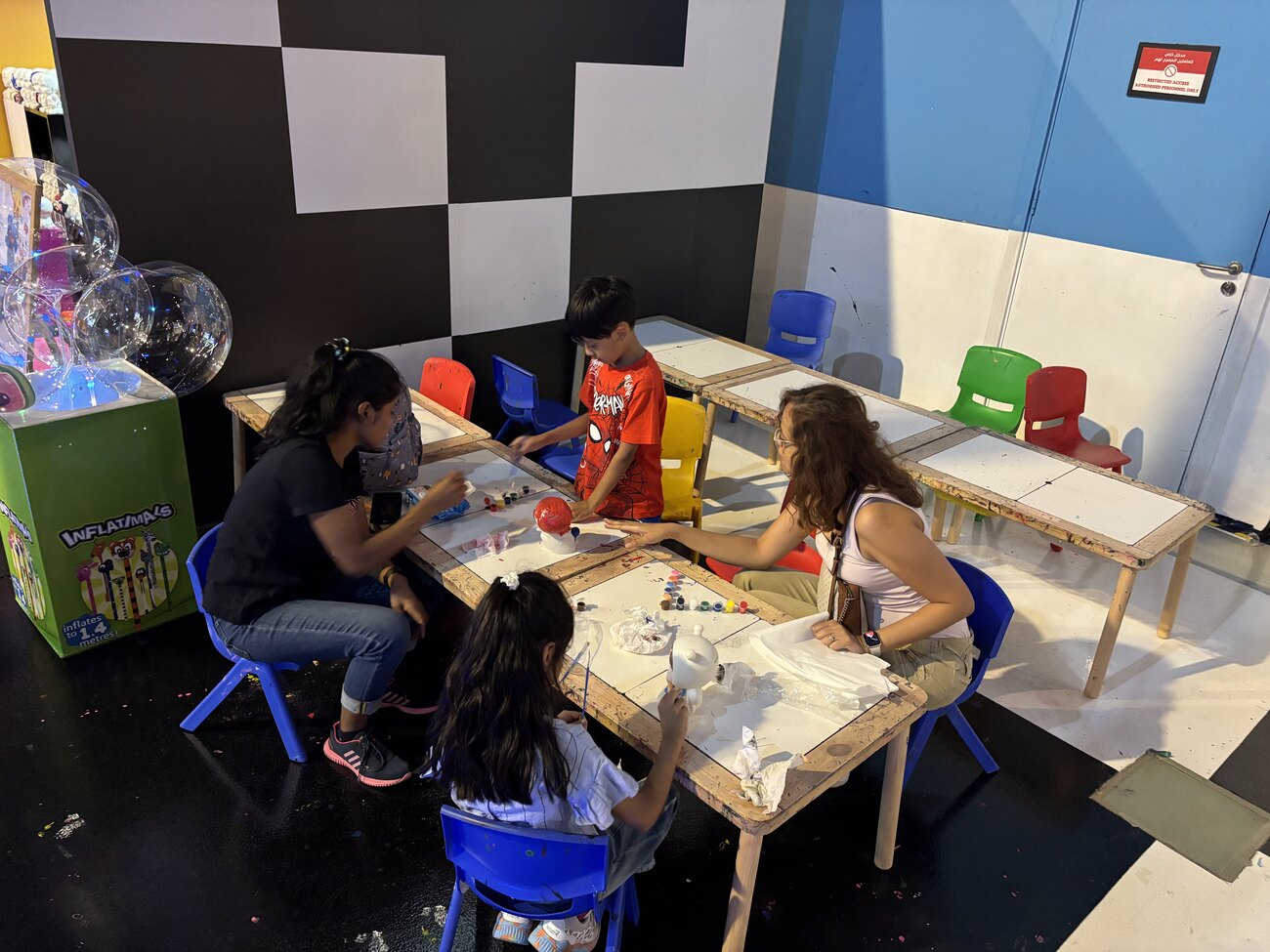 Naimee Orang doing a craft activity with Khushboo Sachdev's twins