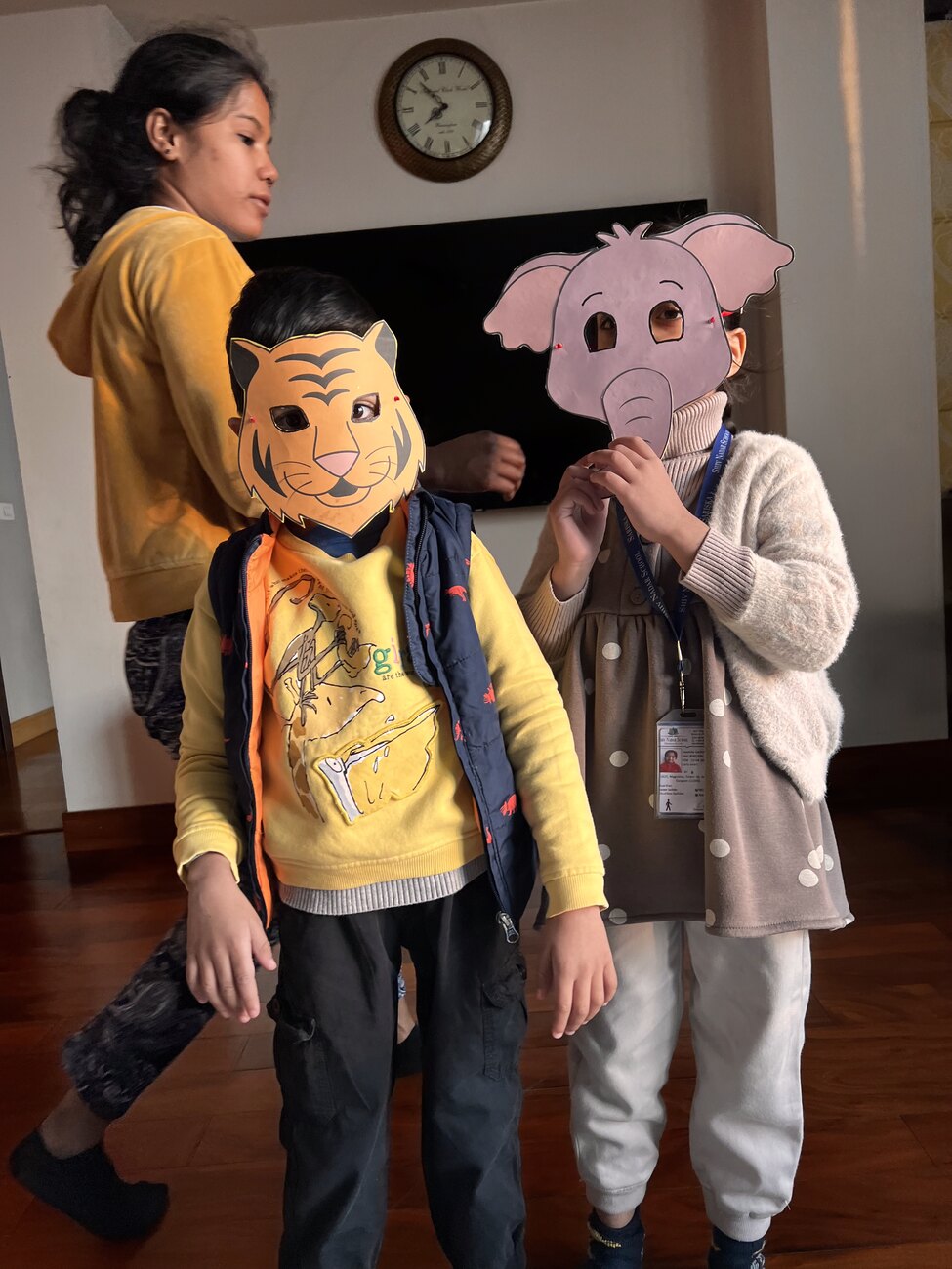 Naimee Orang with Khushboo Sachdev's twins playing with animal masks at home